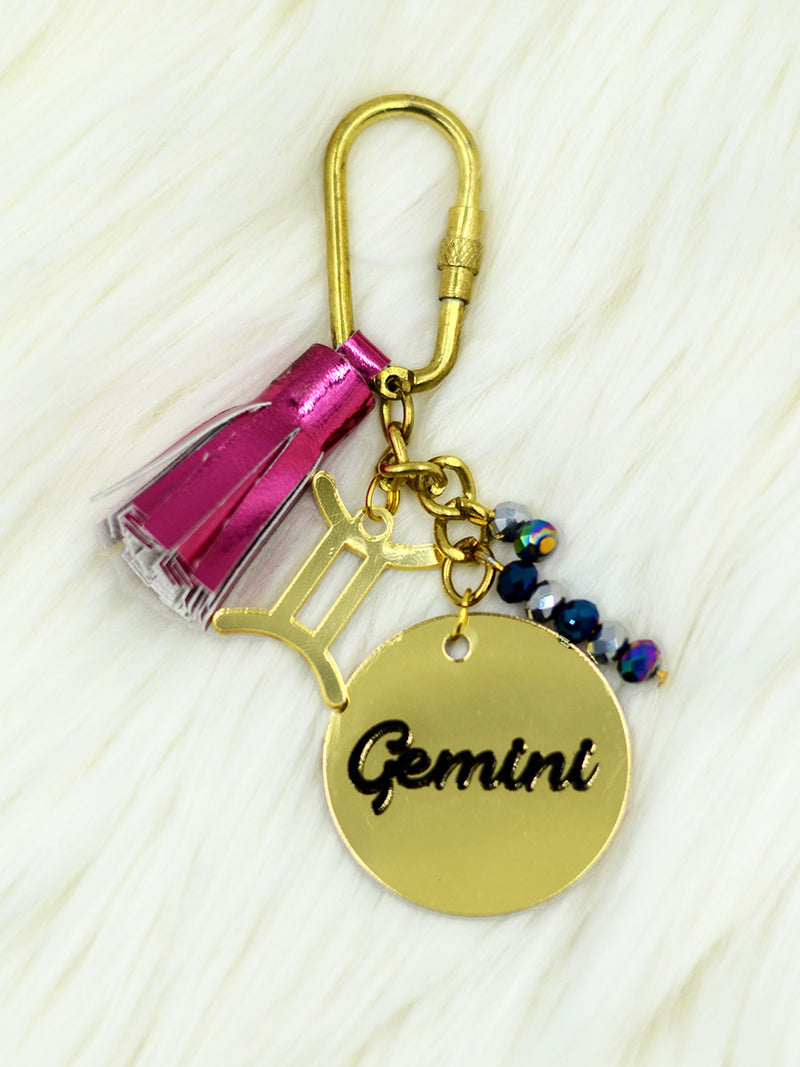 Sun signs Keychain Bagcharm, a unique handcrafted keychain bag charm from our designer collection of hand embroidered keychain and bag charms online.