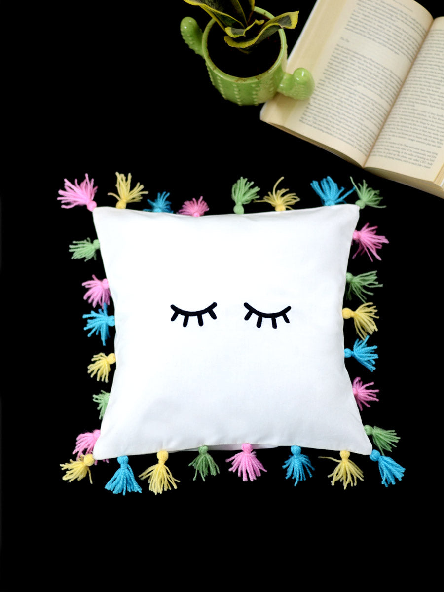 Unicorn Eyes Cushion Cover, a unique hand embroidered cotton cushion cover with tassel detailing from our wide range of quirky, bohemian home decor products like ethnic cushion covers, thread art and more.