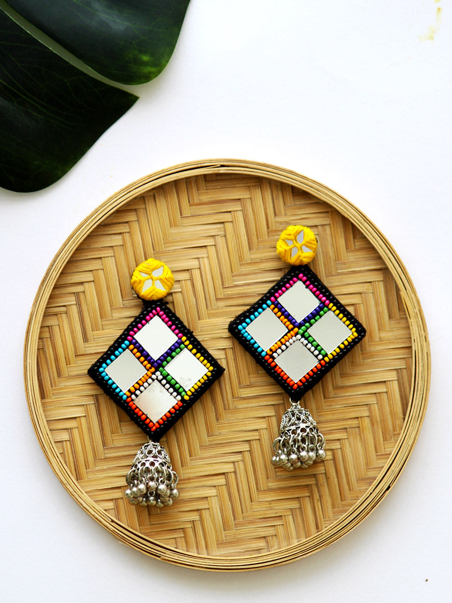 Juhi Hand-embroidered Mirror Jhumkas, a contemporary handcrafted earring from our wedding collection of Kundan, gota patti, pearl earrings and jhumkas for women.