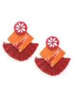 Nida Shine Earrings, a handcrafted unique coin earring with handmade ikat base and mirror and tassel detailing from our bohemian collection of earrings for women.