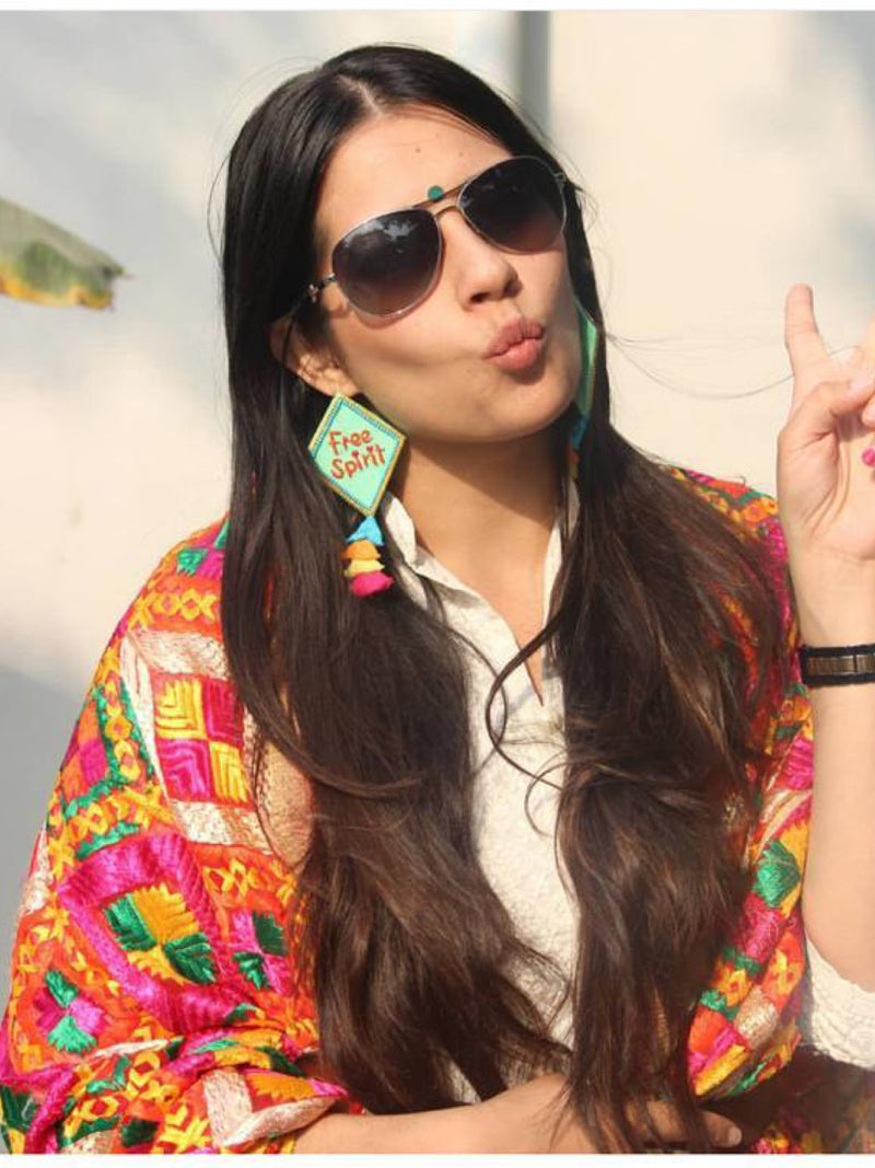 Free Spirit Embroidered Earrings, a bright summer statement earring with tassels from our designer collection of earrings for women online.