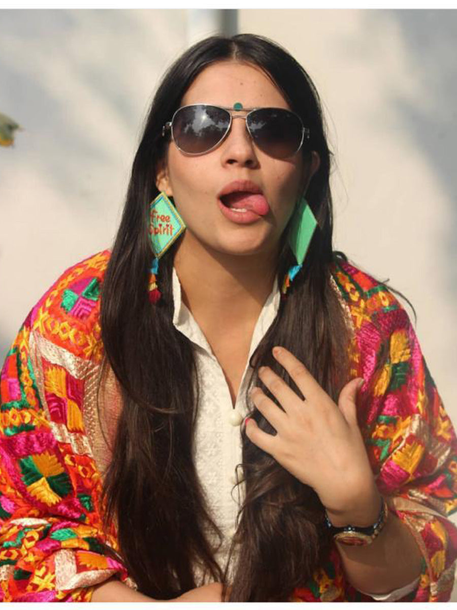 Free Spirit Embroidered Earrings, a bright summer statement earring with tassels from our designer collection of earrings for women.