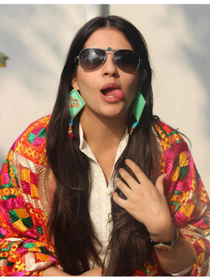 Free Spirit Embroidered Earrings, a bright summer statement earring with tassels from our designer collection of earrings for women.