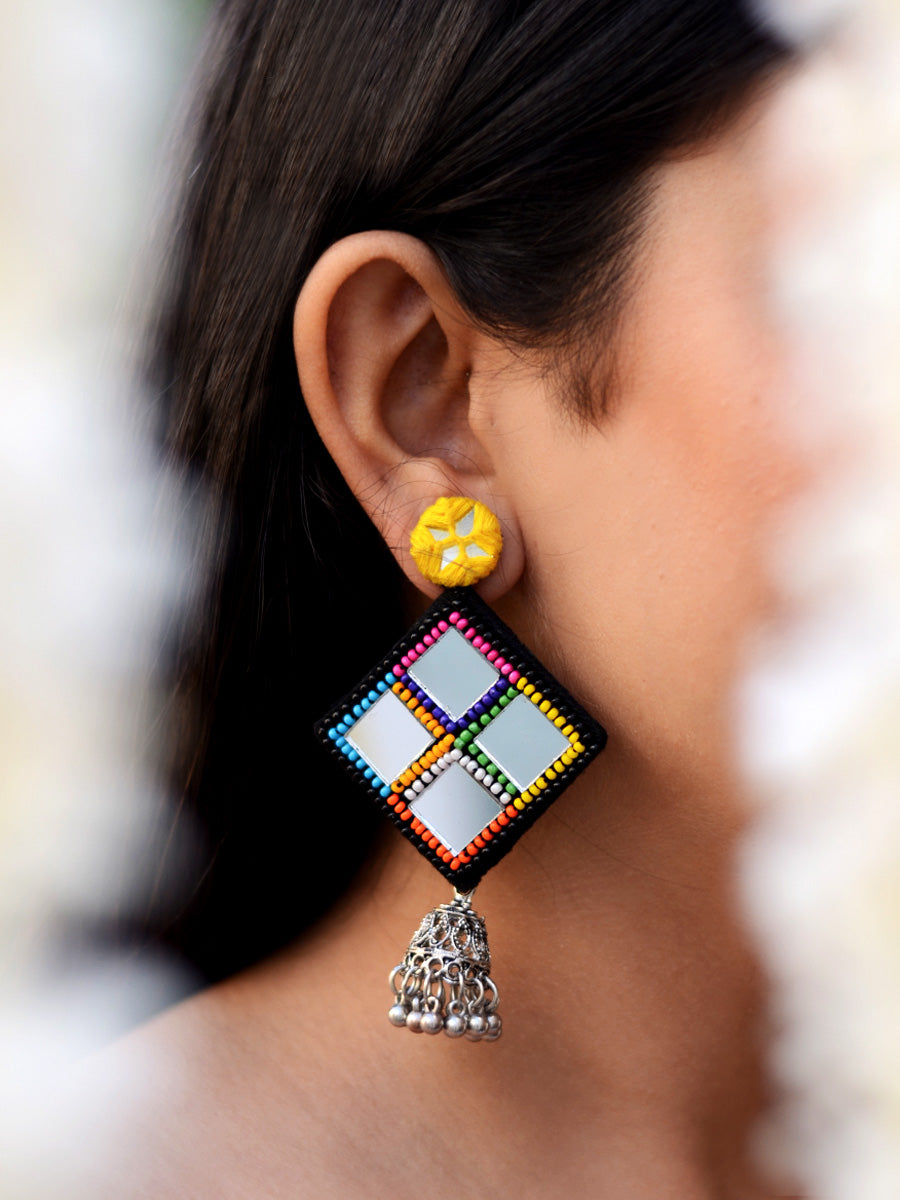 Juhi Hand-embroidered Mirror Jhumkas, a contemporary handcrafted earring from our wedding collection of Kundan, gota patti, pearl earrings and jhumkas for women.