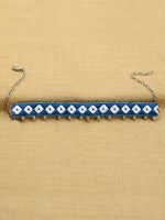 Navy Ghungroo Choker, an embroidered choker necklace with ghungroos from our wide range of tassel necklaces, gota patti chokers, bridal jewellery and more for women online.