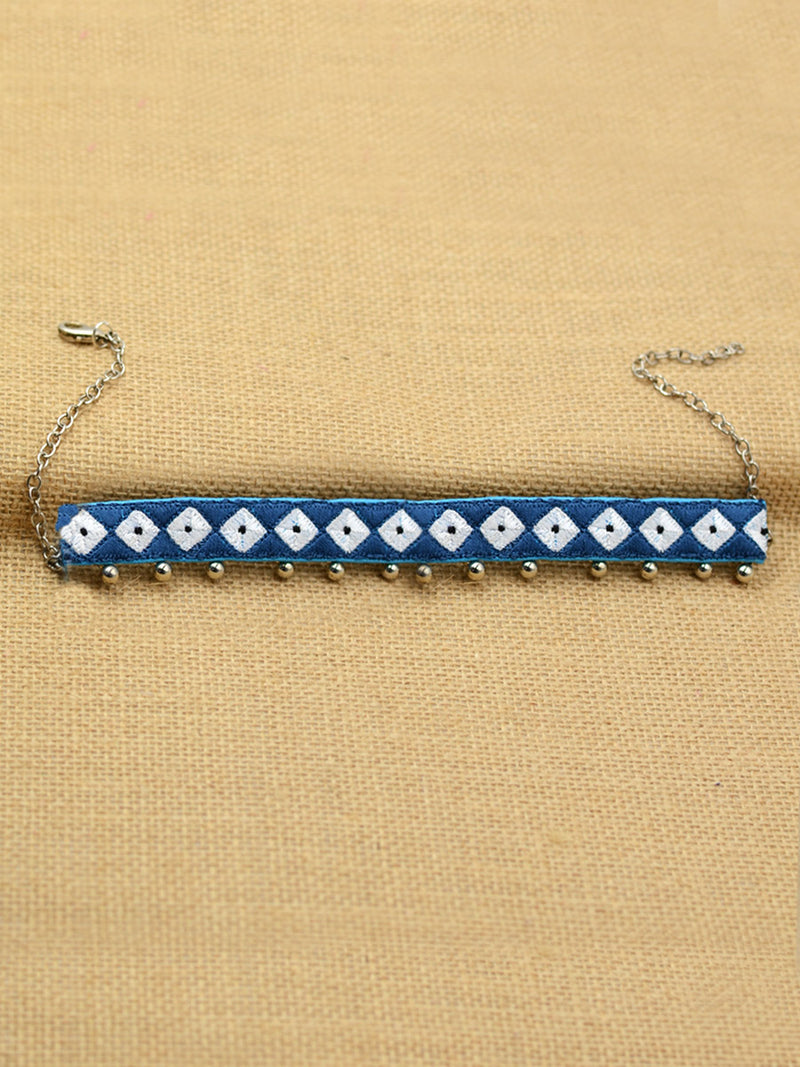 Navy Ghungroo Choker, an embroidered choker necklace with ghungroos from our wide range of tassel necklaces, gota patti chokers, bridal jewellery and more for women online.