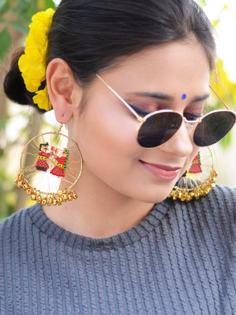 Raja Rani Hoop Earrings, a gorgeous statement earrings with ghungroo and wire detailing from our trending designer collection of hoop earrings for women online.