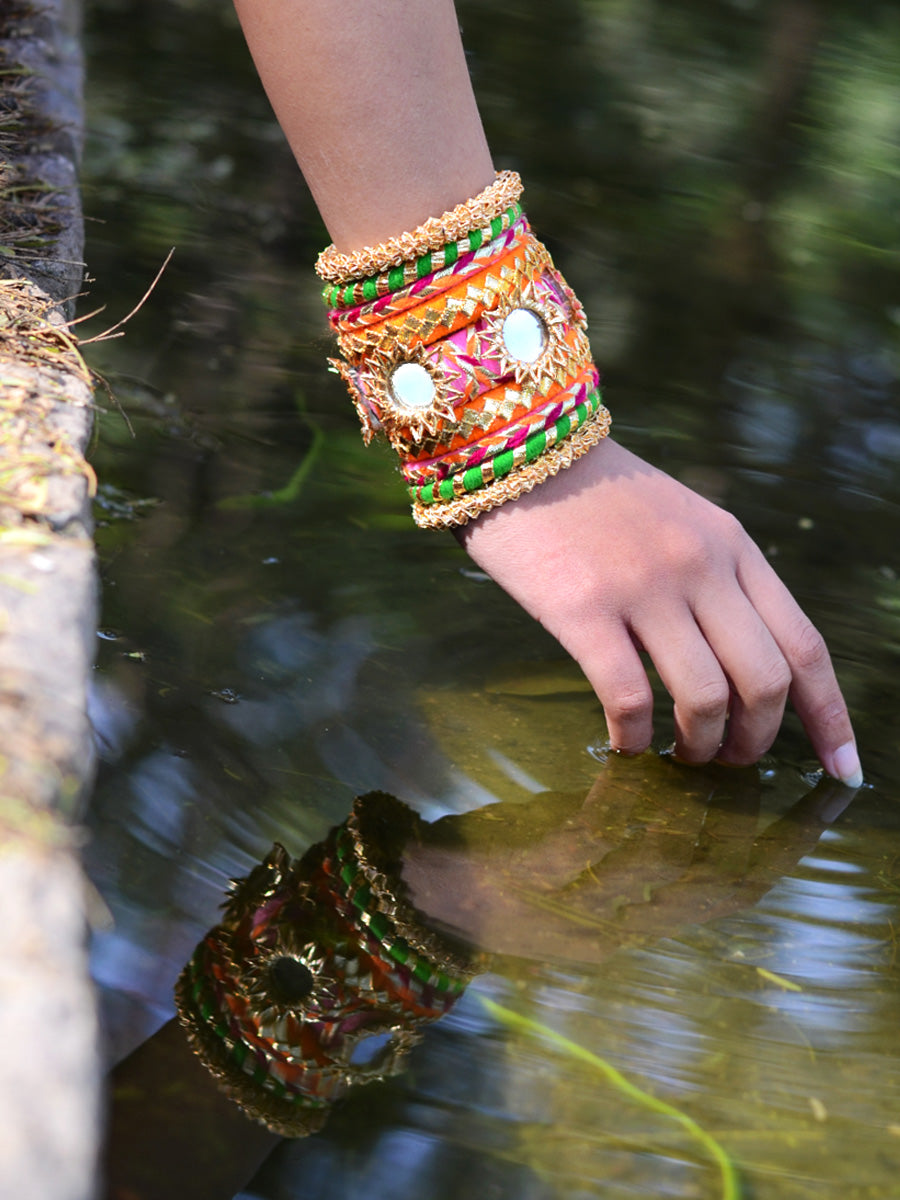 Nargis Gota Bangles (Orange-Green), a unique designer, handcrafted bangle from our latest wedding collection of hand embroidered, kundan, gota, zari and pearl bangles for women online.