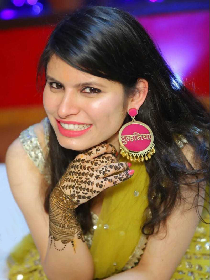 Dulhania Earrings, a quirky, unique, statement party-wear earrings from our designer collection of wedding themed earrings for women online.