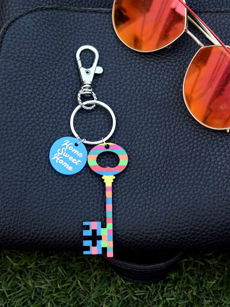 Home Sweet Home Keychain Bagcharm, a unique handcrafted keychain bag charm from our designer collection of hand embroidered keychain and bag charms online.