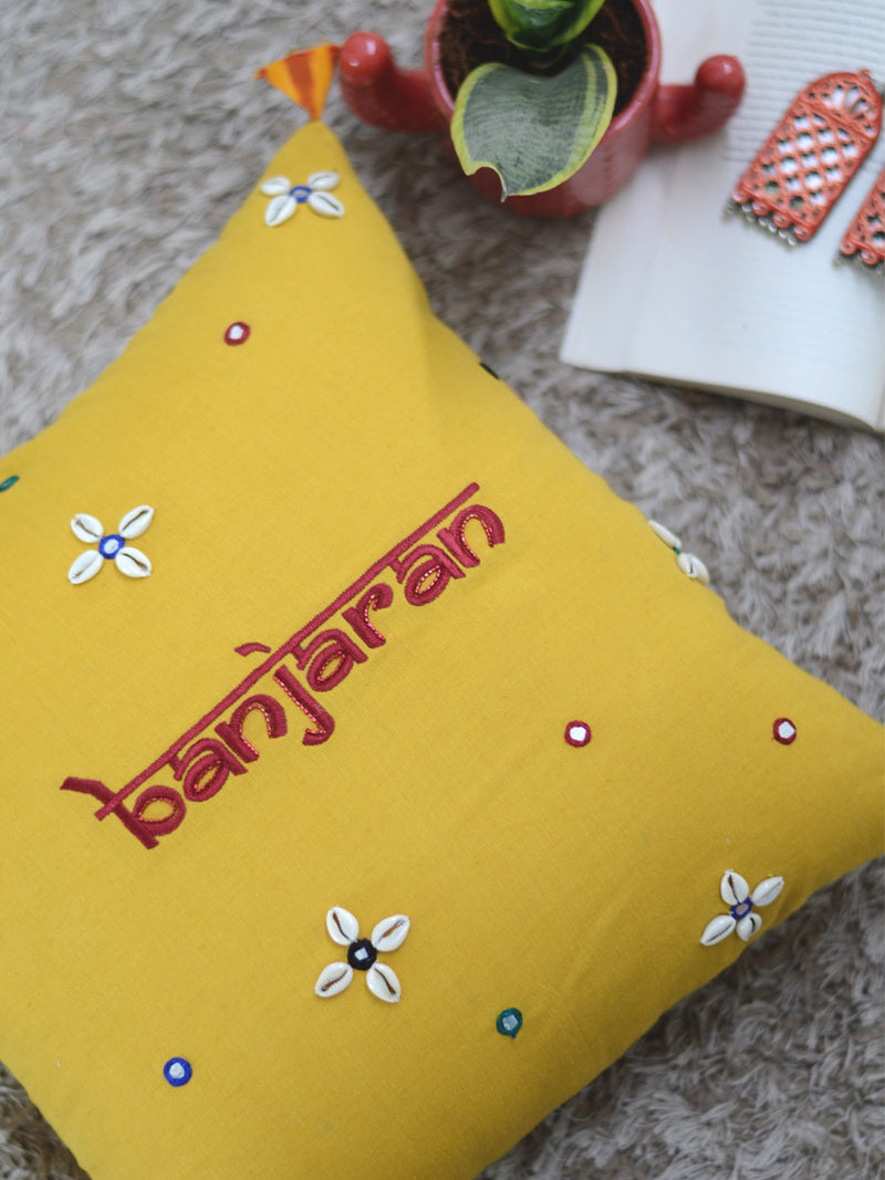 Banjaran Cushion Cover, a unique hand embroidered cotton cushion cover with shell, mirror and tassel detailing from our wide range of quirky, bohemian home decor products like ethnic cushion covers, thread art and more.