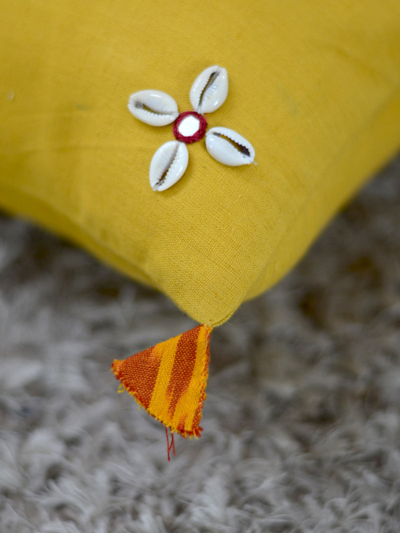 Banjaran Cushion Cover, a hand embroidered cotton cushion cover with shell, mirror and tassel detailing from our wide range of quirky, bohemian home decor products like ethnic cushion covers, wall decor and more.