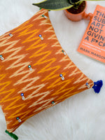 Growth Cushion Cover (Orange/Mustard), a unique hand embroidered cotton cushion cover with mirror and tassel detailing from our wide range of quirky, bohemian home decor products like ethnic cushion covers, thread art, wall decor & wall art, keychain holders and more.