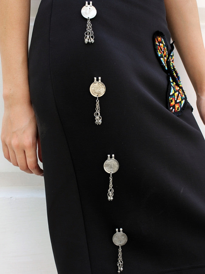 Siya Coin Embellished Pencil Skirt, a hand embroidered designer skirt with tassel detailing from our latest collection of handmade skirts for women online. 