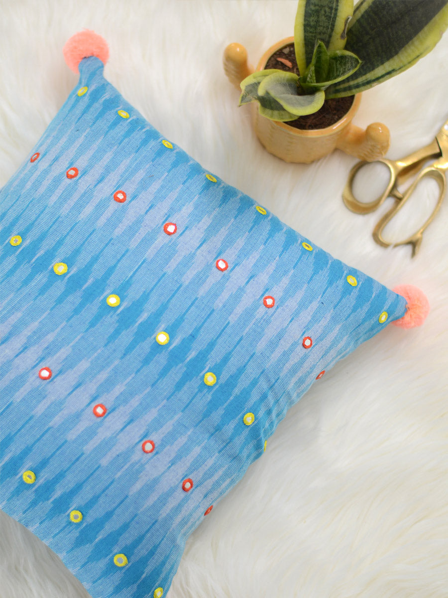 Peace Cushion Cover (Sky Blue), a unique hand embroidered cotton cushion cover with mirror and pom pom detailing from our wide range of quirky, bohemian home decor products like ethnic cushion covers, thread art and more.