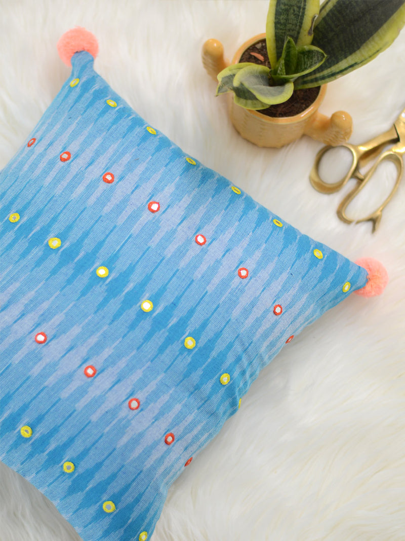 Peace Cushion Cover (Sky Blue), a unique hand embroidered cotton cushion cover with mirror and pom pom detailing from our wide range of quirky, bohemian home decor products like ethnic cushion covers, thread art and more.