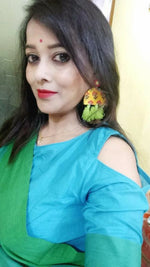 Haseena Hand-embroidered Tassel Earrings, a beautiful handmade hand embroidered earring with mirror and tassel from our designer collection of earrings for women online.