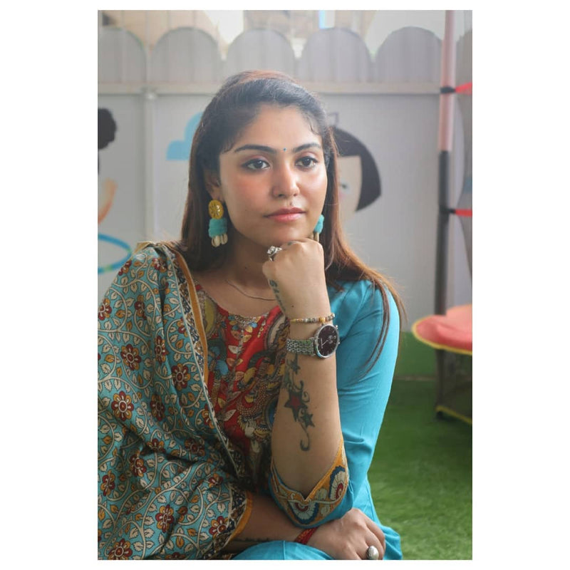 Zoya Pom-pom Shell Earrings, a chic hand embroidered shell earrings with mirror and pom pom detailing from our quirky designer collection of earrings for women online.