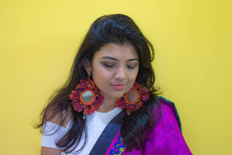 You're my Sun Earrings, a beautiful handmade hand embroidered earring with mirror and tassel from our designer collection of earrings for women online.