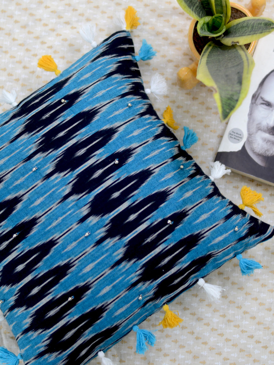 Zen Cushion Cover (Blue/Black), a unique hand embroidered cotton cushion cover with ghungroo and tassel detailing from our wide range of quirky, bohemian home decor products like ethnic cushion covers, thread art, wall decor & wall art and more.