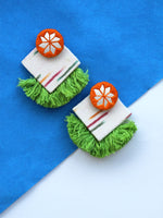 Nida Shine Earrings, a handcrafted unique coin earring with handmade ikat base and mirror and tassel detailing from our bohemian collection of earrings for women online.