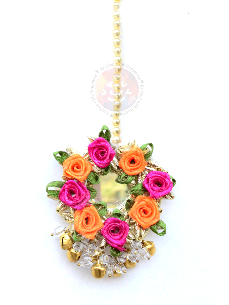Flower Power Maang Teeka (Orange), a contemporary, handcrafted maang tikka from our gota patti collection of maang tikkas with floral and ghungroo detailing for women online.
