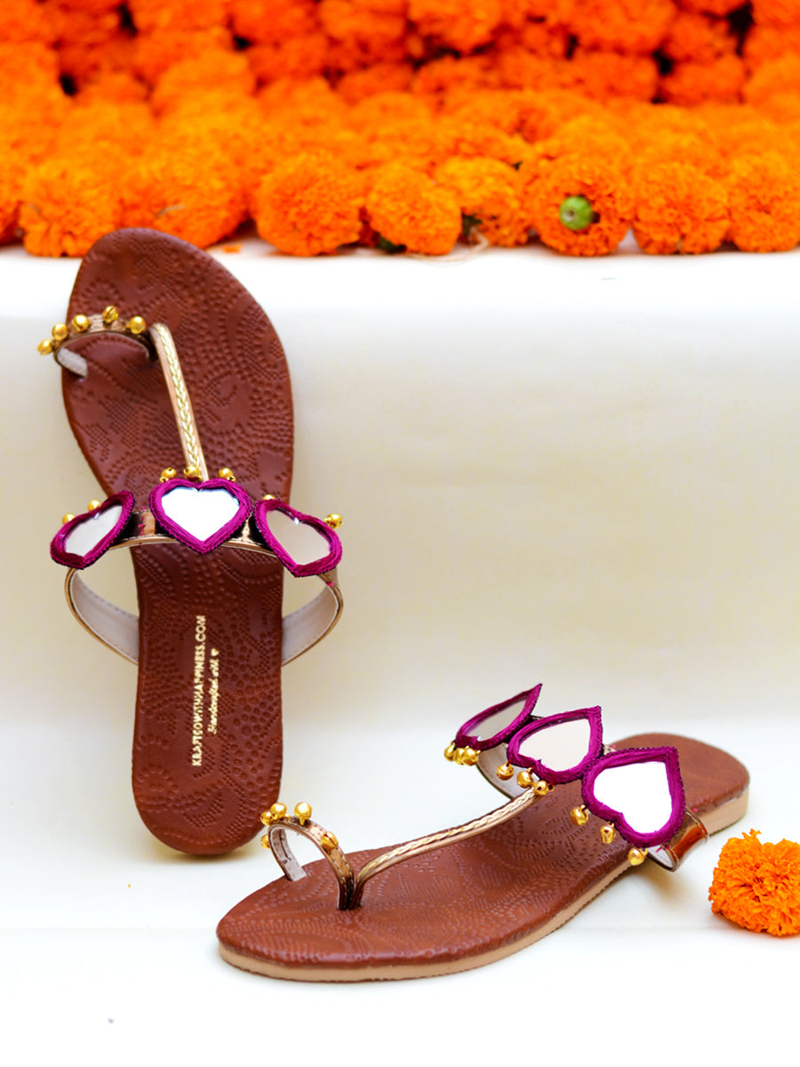 Raani Noor Kolhapuris, a beautifully hand embroidered ethnic kohlapuri footwear with mirror and ghungroo detailing.